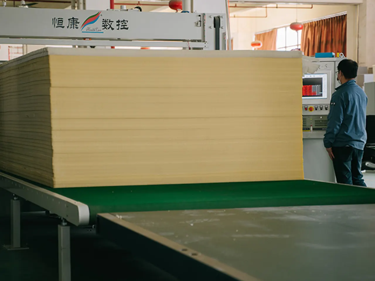 CNC foam cutting line with stacked foam sheets at Baizhijia